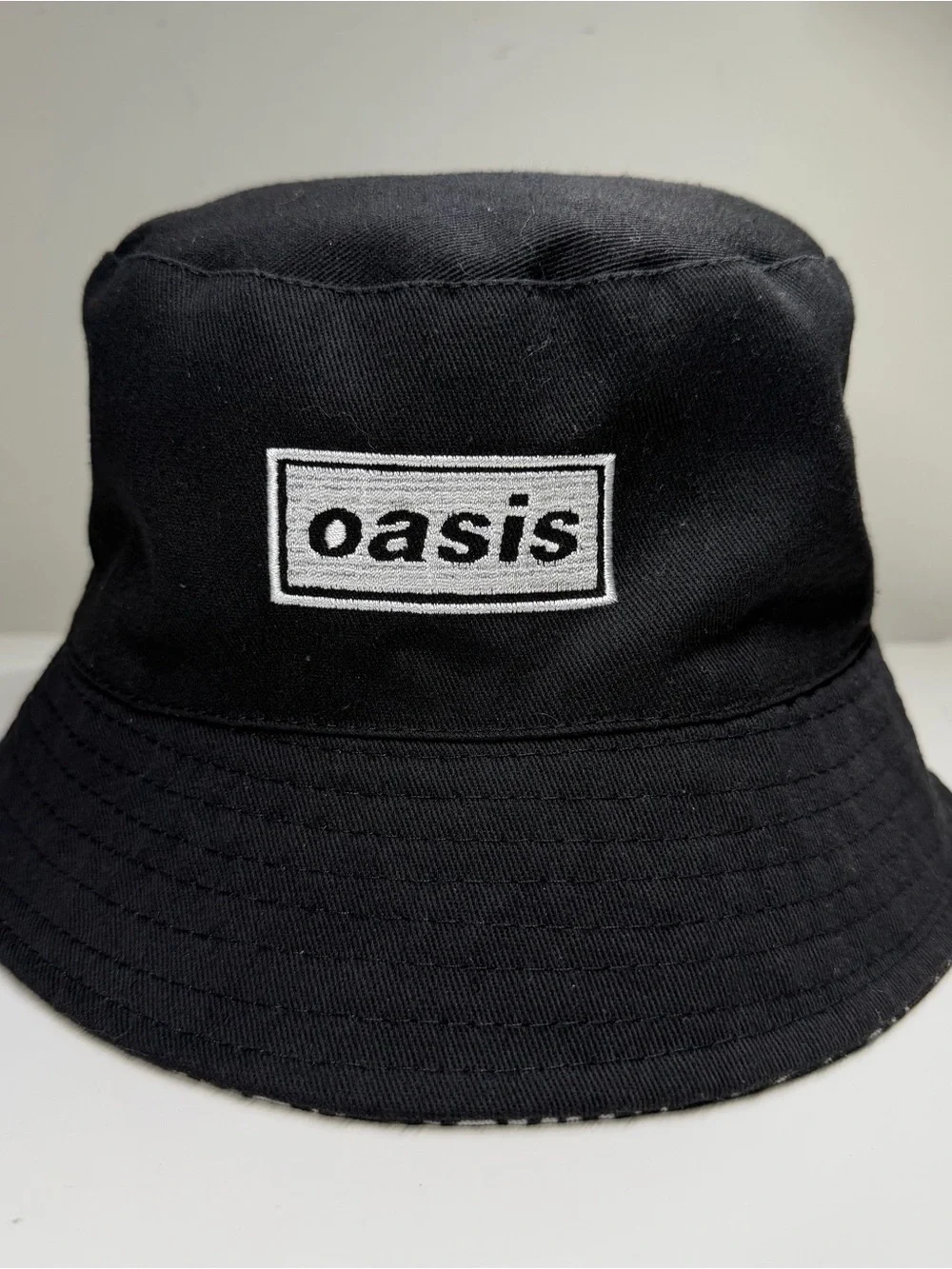 Oasis Live ‘25 reversible bucket hat official merchandise Liam Noel Gallagher